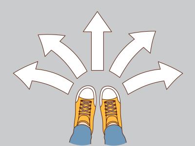 Billede af fødder der skal vælge retning efter pile på jorden 